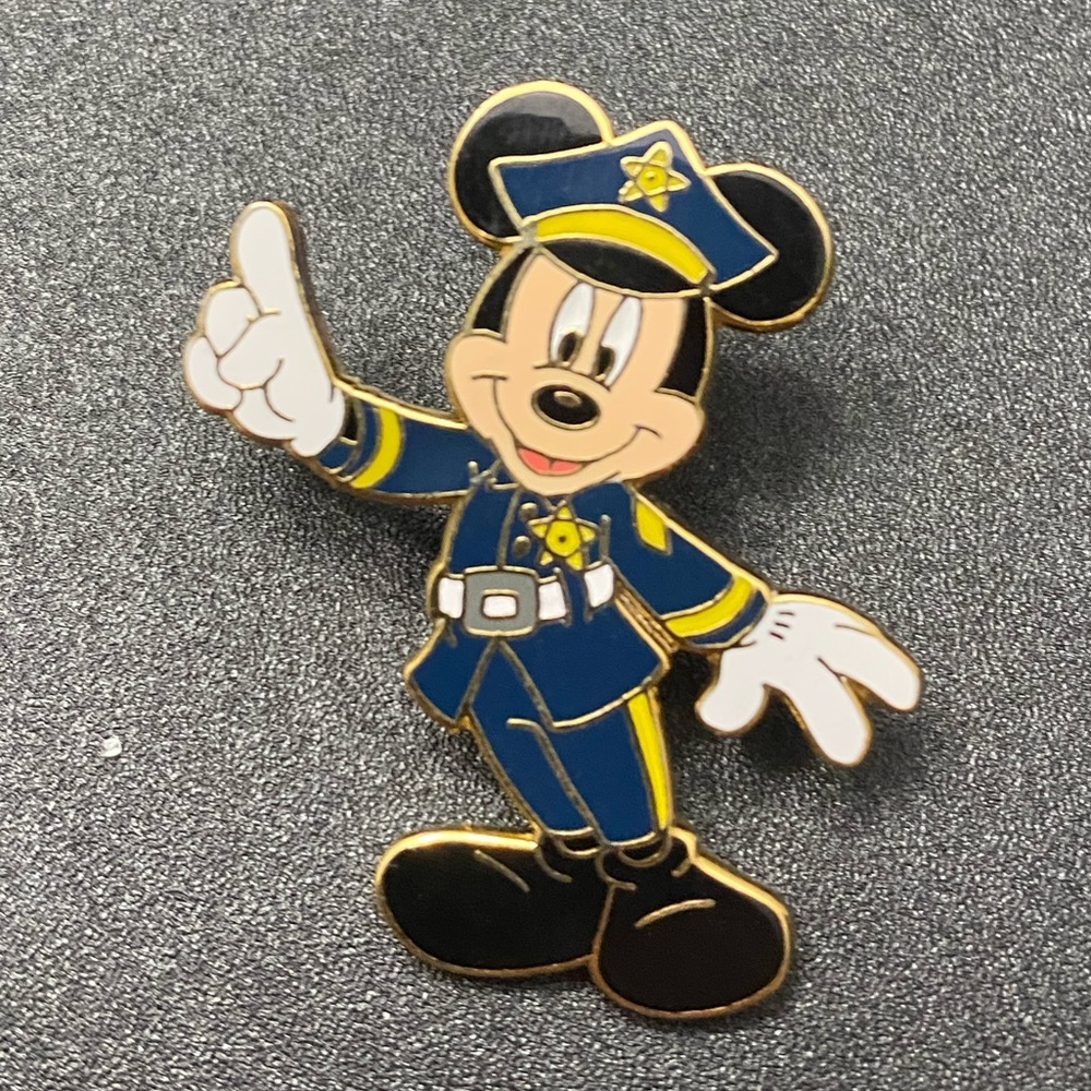Disney pin trading early 2000’s policeman trading pin